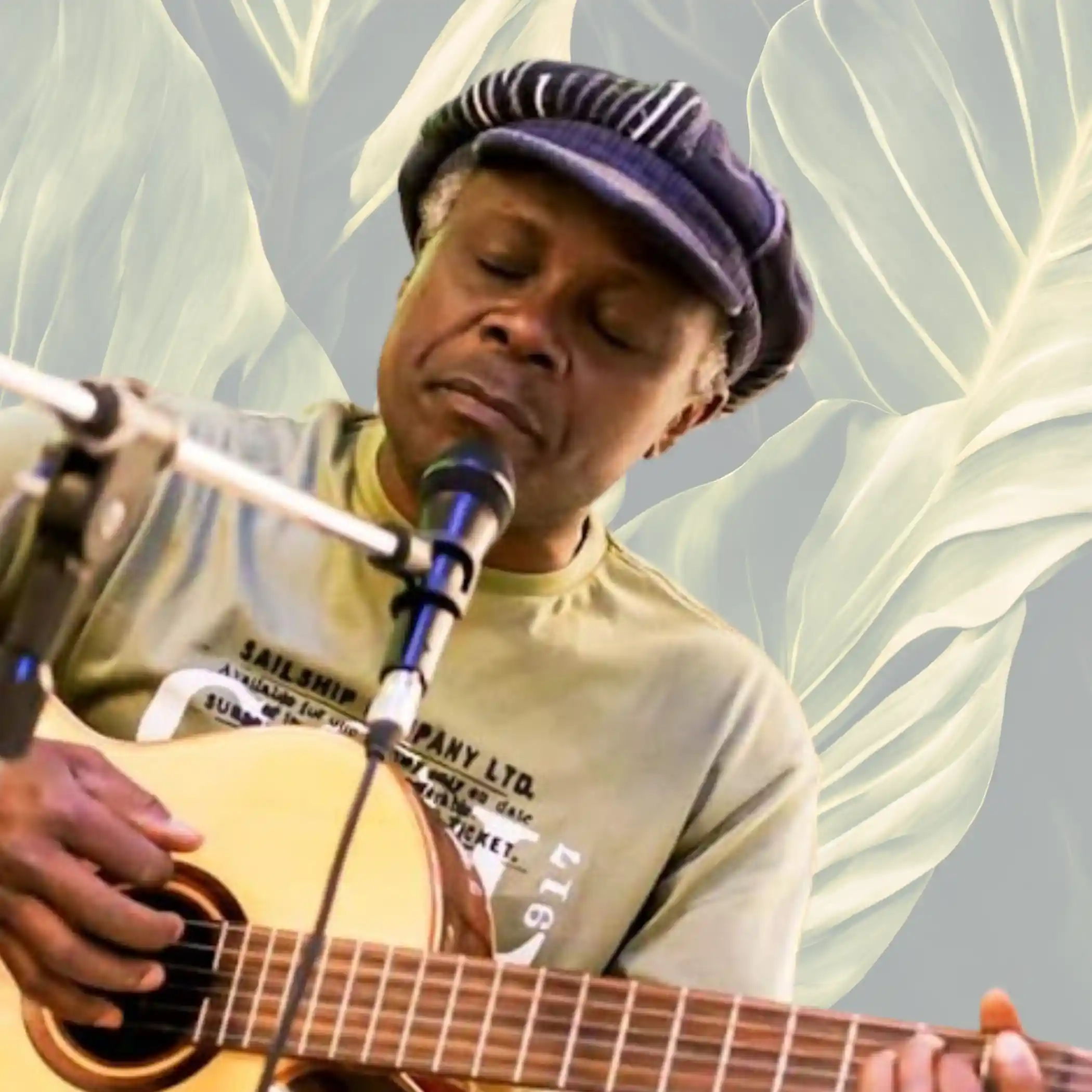 Henri Olama con chitarra dipinta a mano — musicista NNAM Project, Bergamo